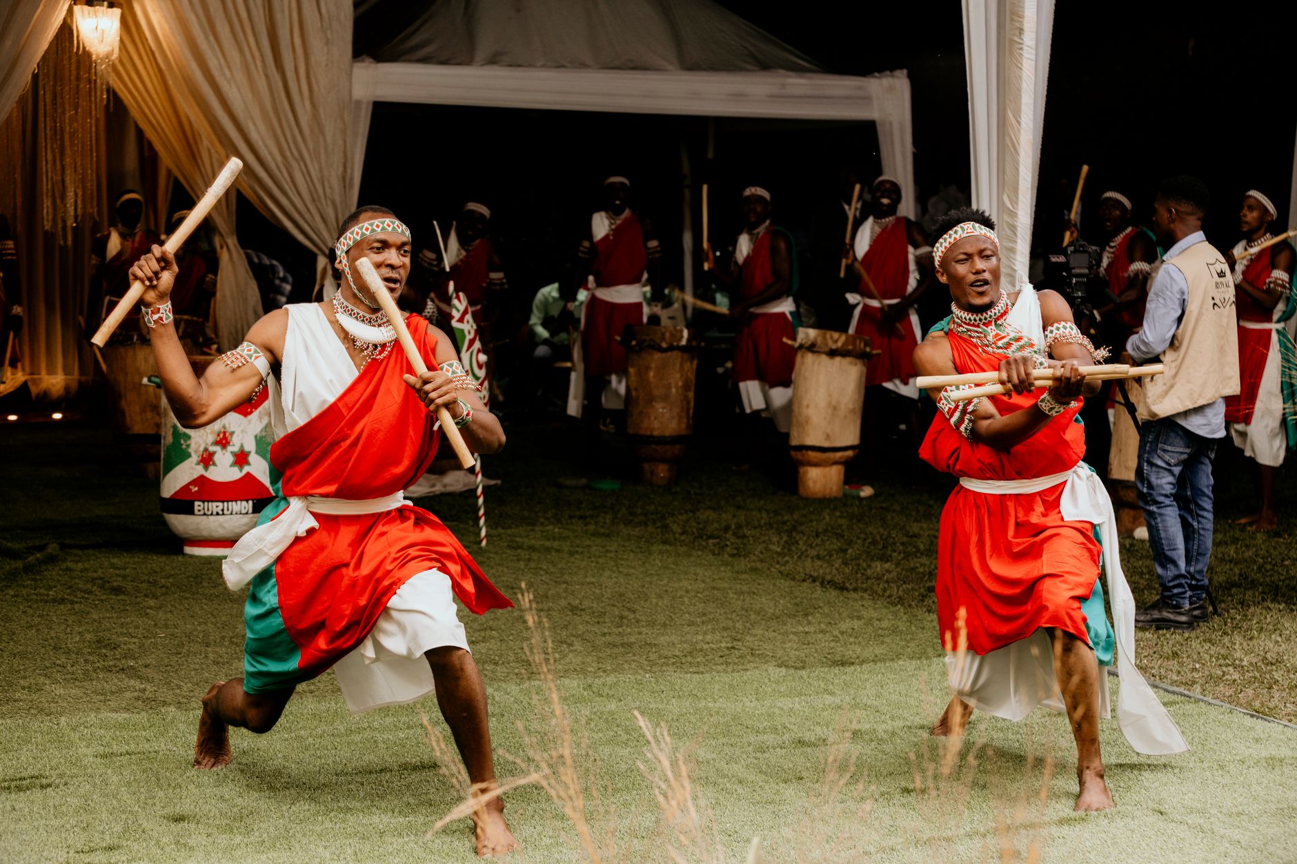 Vibrant traditional dance performance by Burundian dancers in colorful attire.